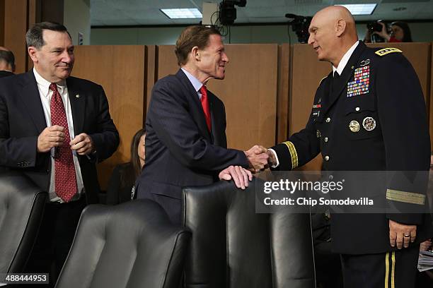 Senate Armed Services Committee members Sen. Joe Donnelly and Sen. Richard Blumenthal greet Chief of Staff of the Army Gen. Raymond Odierno before a...