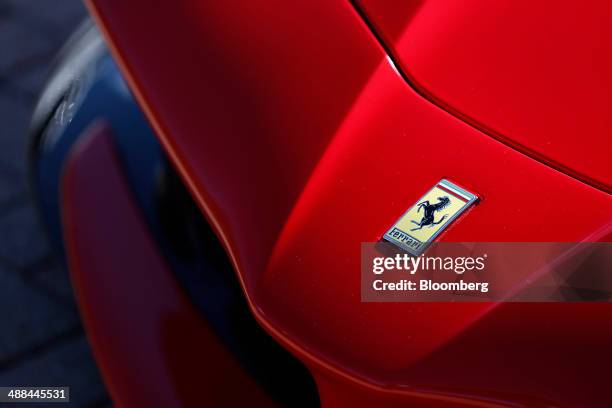 The Ferrari SpA logo is seen on the hood of a LaFerrari vehicle at the Chrysler Group LLC headquarters in Auburn Hills, Michigan, U.S., on Tuesday,...