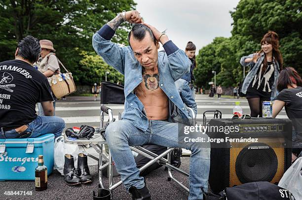 Group of people that gather every weekend in Yoyogi park in Tokio. They dress and dance rockabilly, Japan, Asia.