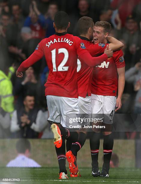 James Wilson of Manchester United celebrates scoring their first goal during the Barclays Premier League match between Manchester United and Hull...