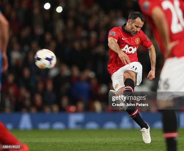 Interim Manager Ryan Giggs of Manchester United takes a free kick during the Barclays Premier League match between Manchester United and Hull City at...
