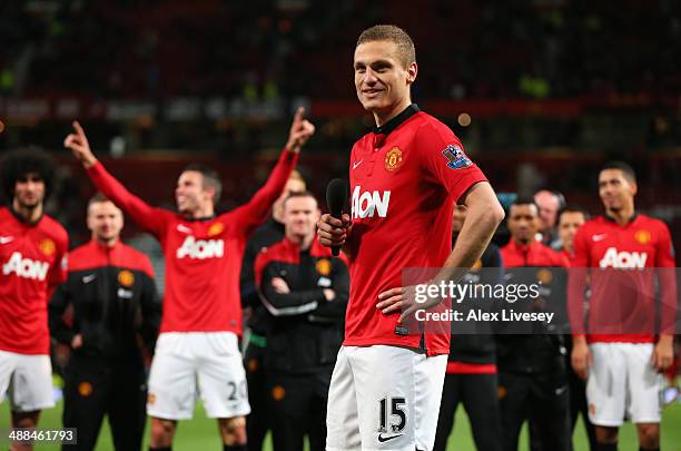 Nemanja Vidic of Manchester United is serenaded by the fans after his final home game for the club at the end of the Barclays Premier League match...