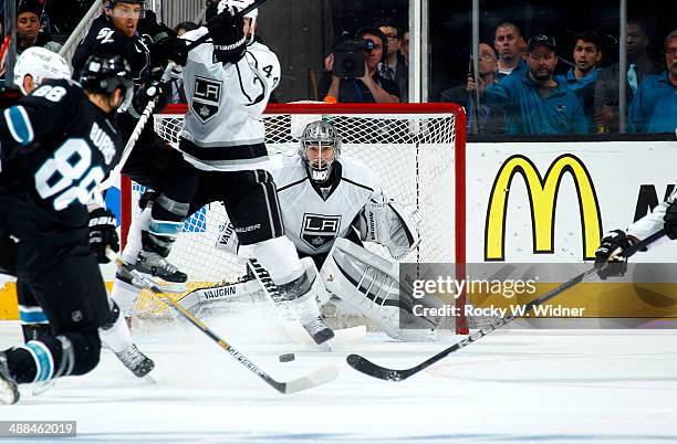 Jonathan Quick of the Los Angeles Kings protects the net against the San Jose Sharks in Game Seven of the First Round of the 2014 NHL Stanley Cup...