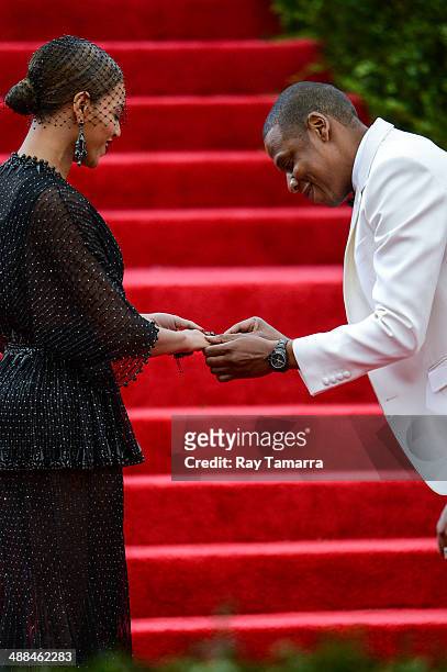 Singer Beyonce Knowles and rapper Jay-Z enter the "Charles James: Beyond Fashion" Costume Institute Gala at the Metropolitan Museum of Art on May 5,...