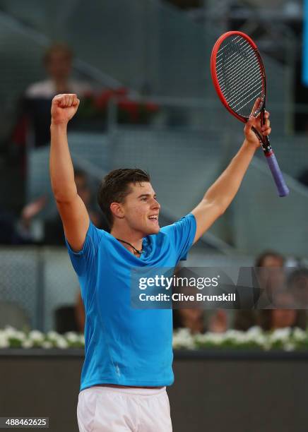 Dominic Thiem of Austria celebrates match point against Stanislas Wawrinka of Switzerland in their second round match during day four of the Mutua...