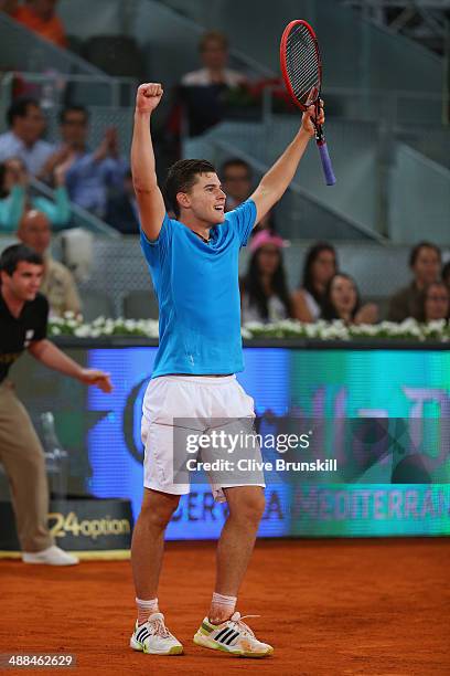 Dominic Thiem of Austria celebrates match point against Stanislas Wawrinka of Switzerland in their second round match during day four of the Mutua...