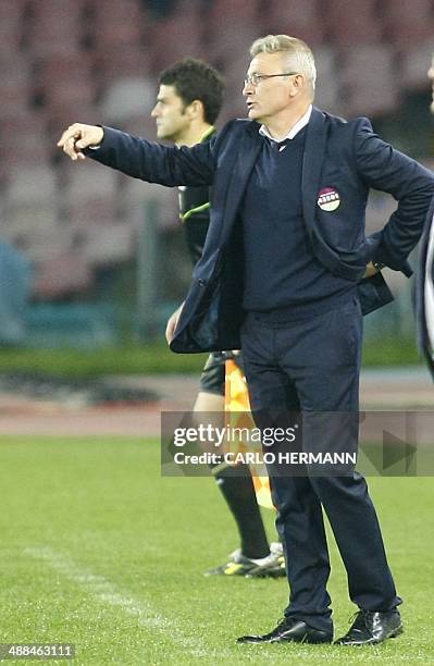 Italian coach Ivo Pulga gestures during the Italian Serie A football match SSC Napoli vs Cagliari Calcio at San Paolo Stadium on May 6, 2014 in...