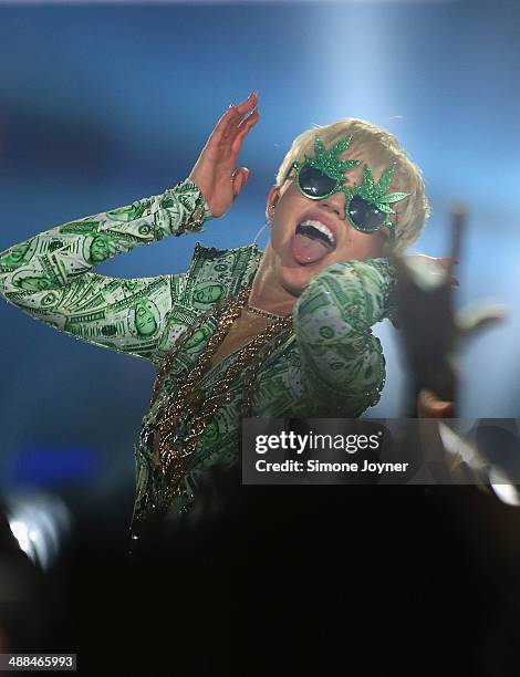 Miley Cyrus performs live on stage at 02 Arena on May 6, 2014 in London, England.