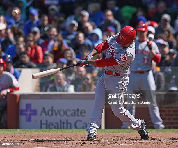 Ramon Santiago of the Cincinnati Reds bats against the Chicago Cubs at Wrigley Field on April 18, 2014 in Chicago, Illinois. The Reds defeated the...