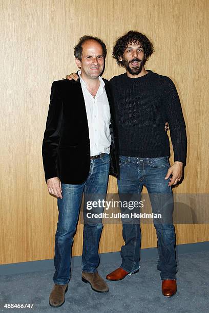 French actors Lionel Abelanski and Tomer Sisley attend the "Kidon" Paris premiere at Pathe Beaugrenelle on May 6, 2014 in Paris, France.