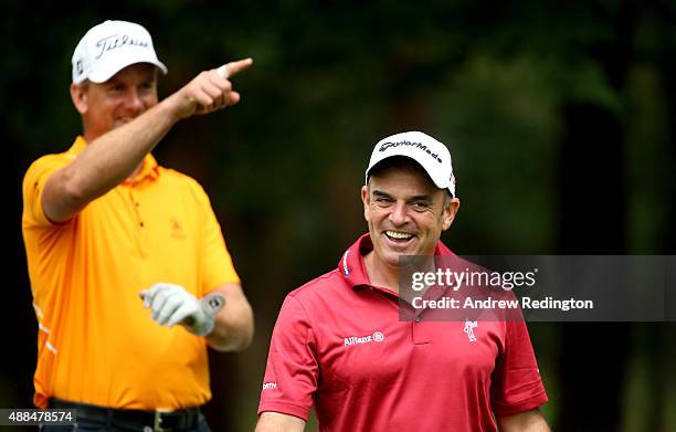 Robert Karlsson of Sweden and Paul McGinley of Ireland share a joke during the Pro Am prior to the start of the 72nd Open d'Italia at Golf Club...