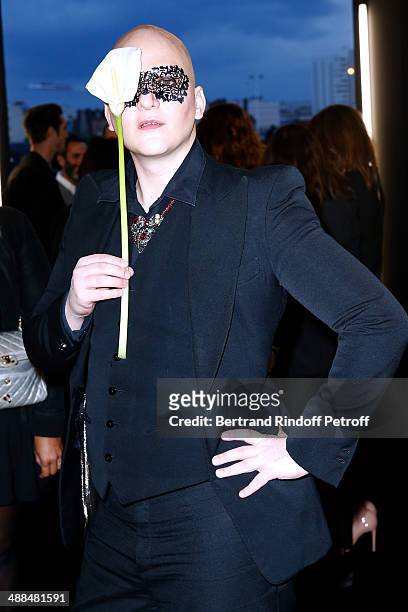 Photographer Ali Mahdavi attends the Cocktail for the discovery of new fragrance "Black Opium" by Yves Saint Laurent on May 6, 2014 in Paris, France..