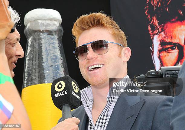 Boxer Canelo Alvarez speaks with the media after the press conference for Canelo Alvarez v Erislandy Lara on May 6, 2014 in Los Angeles, California.