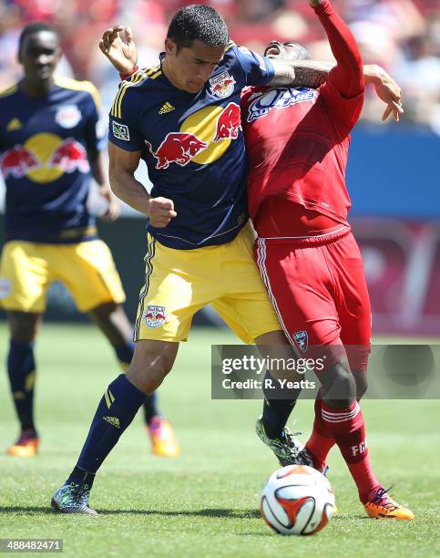 Roy Miller of New York Red Bulls defends the ball from Jair Benitez of FC Dallas at Toyota Stadium in Frisco on May 4, 2014 in Frisco, Texas.