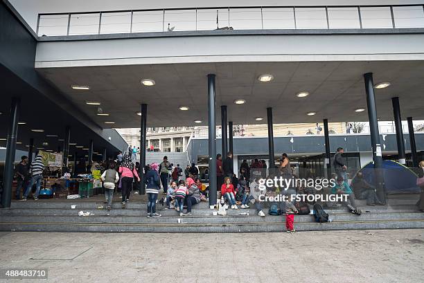 refugees at metro station of keleti budapest - afghan refugees bildbanksfoton och bilder