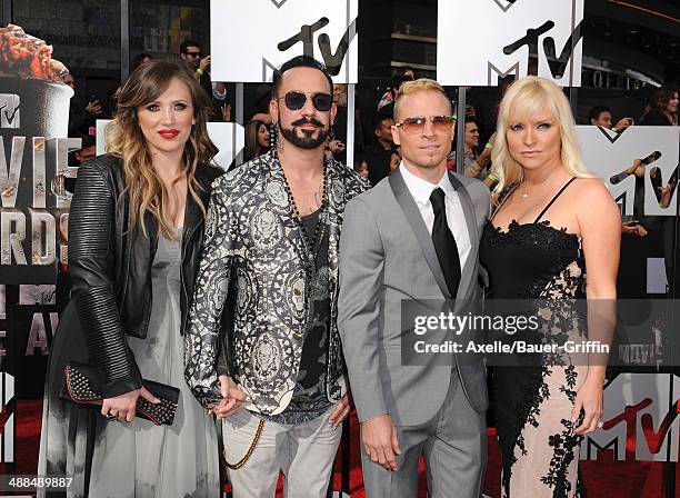 Rochelle Deanna Karidis, musicians A.J. McLean and Brian Littrell of the Backstreet Boys and Leighanne Littrell arrive at the 2014 MTV Movie Awards...