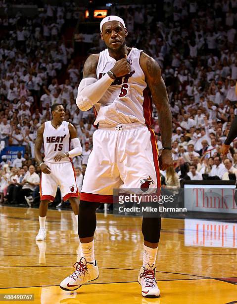 LeBron James of the Miami Heat reacts to a play during Game One of the Eastern Conference Semifinals of the 2014 NBA Playoffs against the Brooklyn...