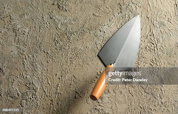 brick layers trowel on concrete/landscape - trowel stock pictures, royalty-free photos & images