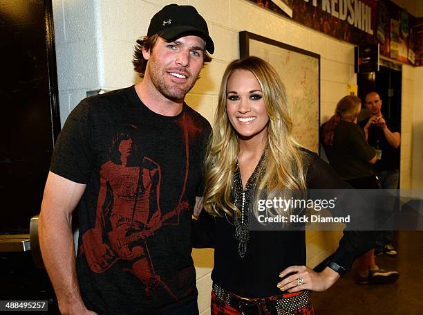 The Nashville Predators' Mike Fisher and Carrie Underwood attend Keith Urban's Fifth Annual "We're All 4 The Hall" Benefit Concert at the Bridgestone...