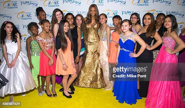 Tyra Banks and the girls of the Tyra Banks TZONE attend Tyra Banks' Flawsome Ball 2014 at Cipriani Wall Street on May 6, 2014 in New York City.