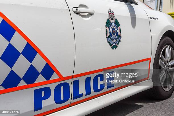 police car in broadbeach on the gold coast of australia - queensland stock pictures, royalty-free photos & images