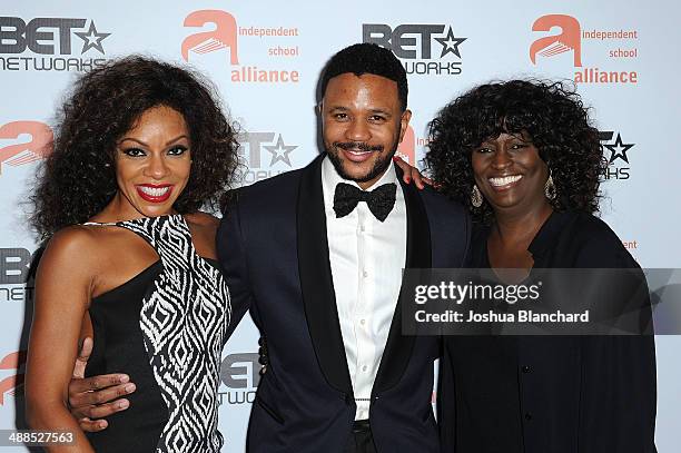 Actors Wendy Raquel Robinson, Hosea Chanchez and Honoree and President of Original Programming for BET Loretha Jones arrive at the Independent School...