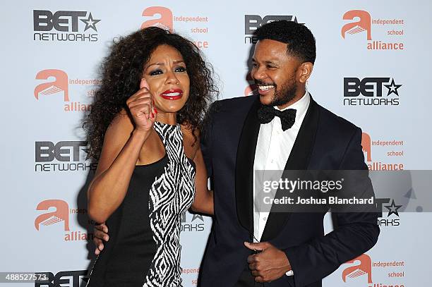 Actors Wendy Raquel Robinson and Hosea Chanchez arrive at the Independent School Alliance For Minority Affairs Impact Awards Dinner at the Beverly...