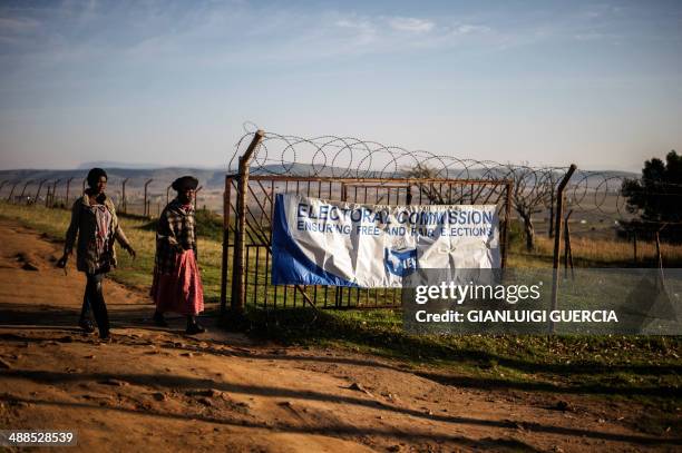 Residents of Qunu leaves the polling station after casting their ballot as part of the general elections, on May 7, 2014 in Qunu. South Africans vote...