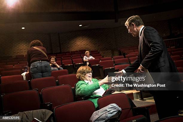 Don Beyer greets a voter before a Mt. Vernon District Democratic candidate forum to replace retiring US Rep. Jim Moran in Alexandria, Va. Saturday...