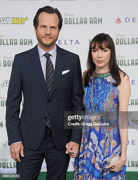 Actor Bill Paxton and wife Louise Newbury arrive at the Los Angeles premiere of "Million Dollar Arm" at the El Capitan Theatre on May 6, 2014 in...