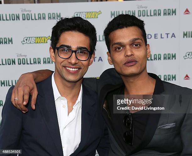 Actors Suraj Sharma and Madhur Mittal attend the premiere of Disney's "Million Dollar Arm" at the El Capitan Theatre on May 6, 2014 in Hollywood,...