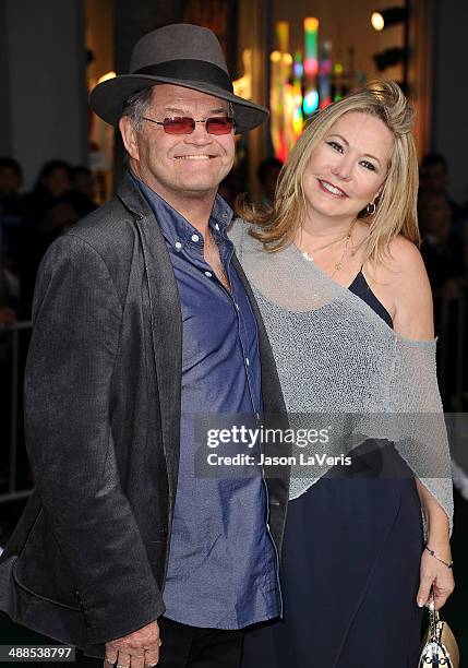 Micky Dolenz and wife Donna Quinter attend the premiere of "Million Dollar Arm" at the El Capitan Theatre on May 6, 2014 in Hollywood, California.