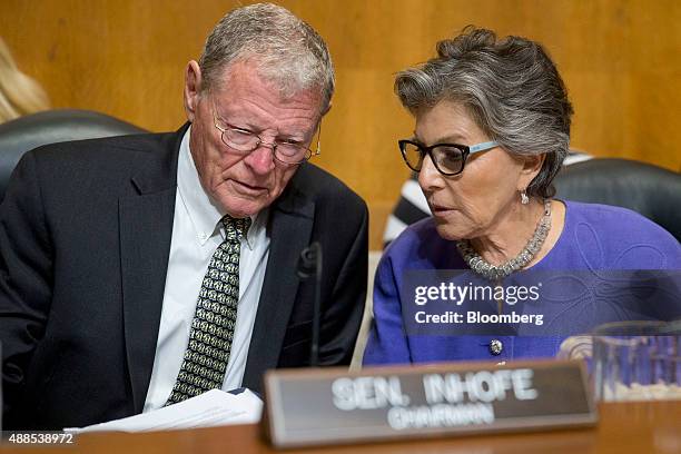 Senator James Inhofe, a Republican from Oklahoma and chairman of the Senate Environment and Public Works Committee, left, speaks to Senator Barbara...