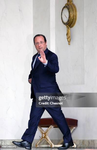 French President, Francois Hollande leaves after a cabinet meeting at the Elysee Palace on May 7, 2014 in Paris, France.