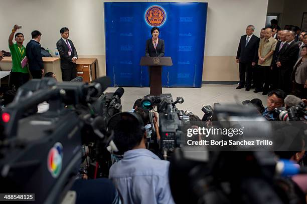 Thai Prime Minister Yingluck Shinawatra talks during a press conference at the Defence Permanent Secretary Office on May 7, 2014 in Bangkok,...