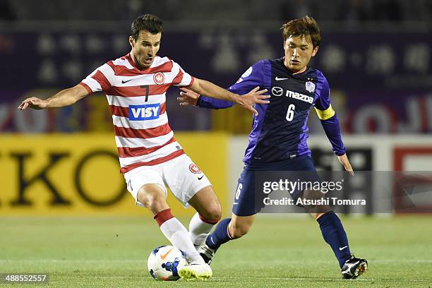 Labinot Haliti of Western Sydney Wanderers and Toshihiro Aoyama of Sanfrecce Hiroshima battles for the ball during the AFC Champions League round of...