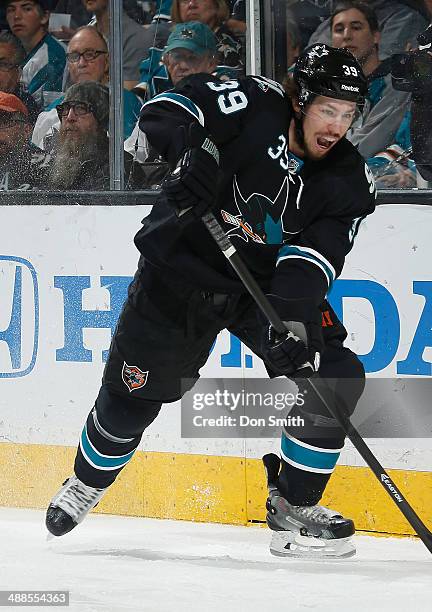 Logan Couture of the San Jose Sharks skates up the ice against the Los Angeles Kings in Game Seven of the First Round of the 2014 Stanley Cup...