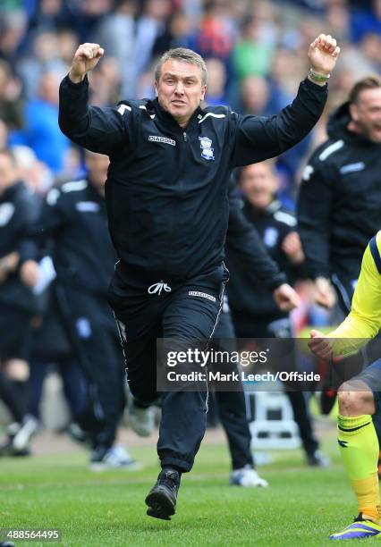 Birmingham manager Lee Clark celebrates at full-time after avoiding relegation following the Sky Bet Championship match between Bolton Wanderers and...