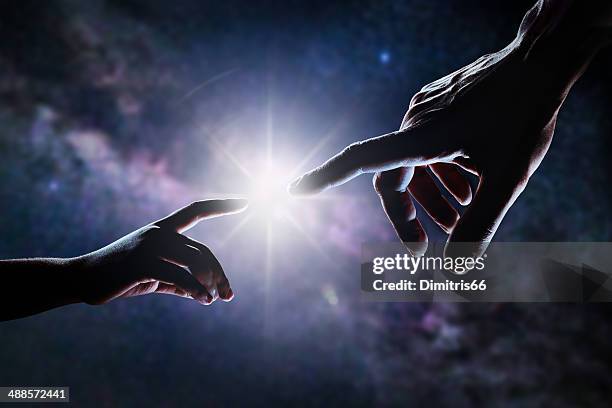 hand of god - origin stock pictures, royalty-free photos & images