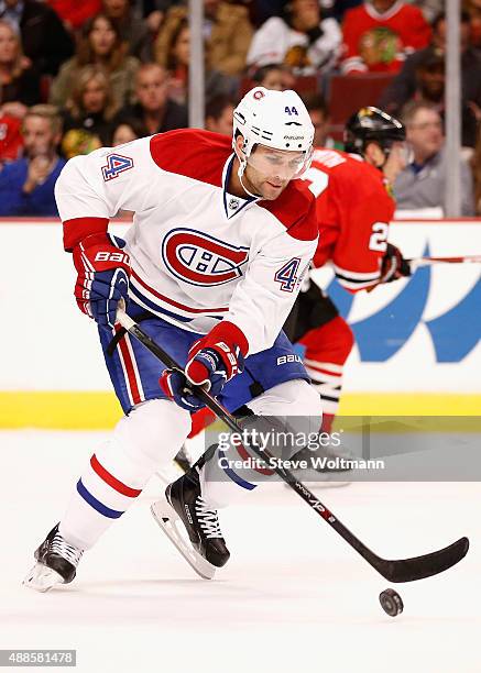 Davis Drewiske of the Montreal Canadiens plays in the preseason game against the Chicago Blackhawks at the United Center on October 1, 2014 in...