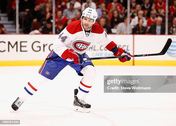Davis Drewiske of the Montreal Canadiens plays in the preseason game against the Chicago Blackhawks at the United Center on October 1, 2014 in...