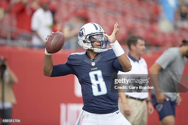 Closeup of Tennessee Titans QB Marcus Mariota warming up on field before game vs Tampa Bay Buccaneers at Raymond James Stadium. First game of...