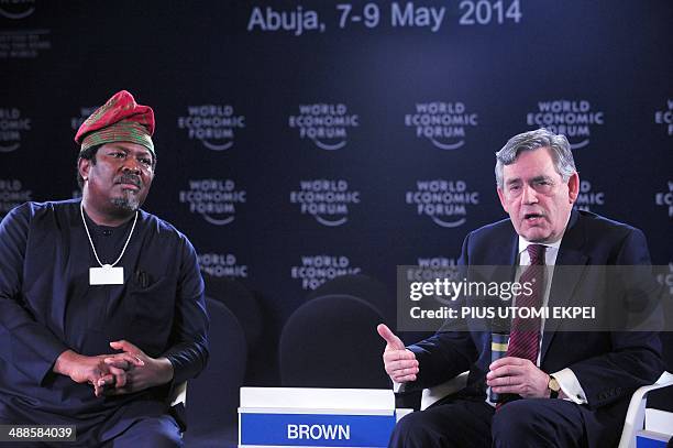 Former British Prime Minister Gordon Brown speaks next to Publisher of This Day newspapers Nduka Obaigbena about "Safe Schools Initiative" at the...