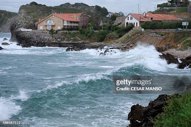 Big waves hit the coast of Comillas in the northern Spanish region of Cantabria, on September 16, 2015. AFP PHOTO / CESAR MANSO