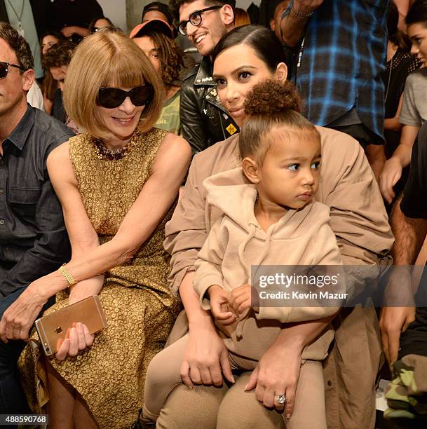 Anna Wintour, Kim Kardashian West and North West attend Kanye West Yeezy Season 2 during New York Fashion Week at Skylight Modern on September 16,...
