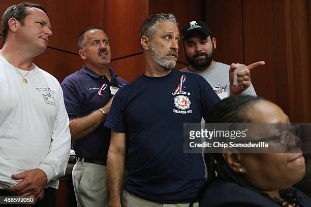 Comedian Jon Stewart joins ill first-responders for a news conference to demand that Congress pass an extension of the Zadroga 9/11 health bill at...