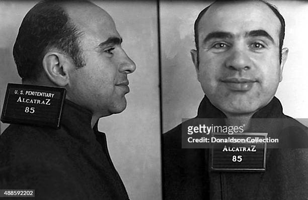 Gangster Alphonse 'Al' Capone poses for a mugshot on his arrival at the Federal Penitentiary at Alcatraz on August 22, 1934 in San Francisco,...
