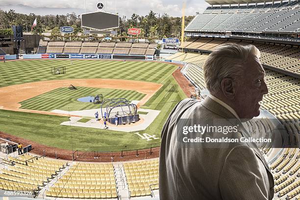 Radio announcer Vin Scully poses for a poses for a portrait in his studio booth on July 29, 2015 at Dodger Stadium in Los Angeles, California.