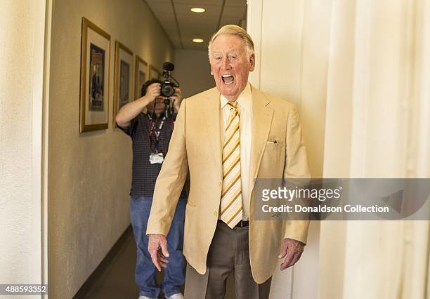 Radio announcer Vin Scully poses for a poses for a portrait in his studio booth on July 29, 2015 at Dodger Stadium in Los Angeles, California.
