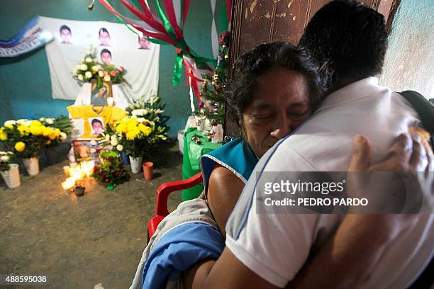 Relatives of Alexander Mora, one of the 43 missing students, whose remains, according to the Government version, were found in a landfill in Cocula,...